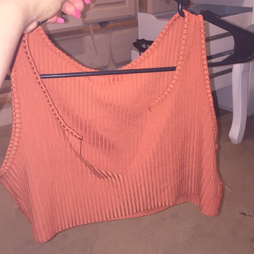Orange v neck crop top.